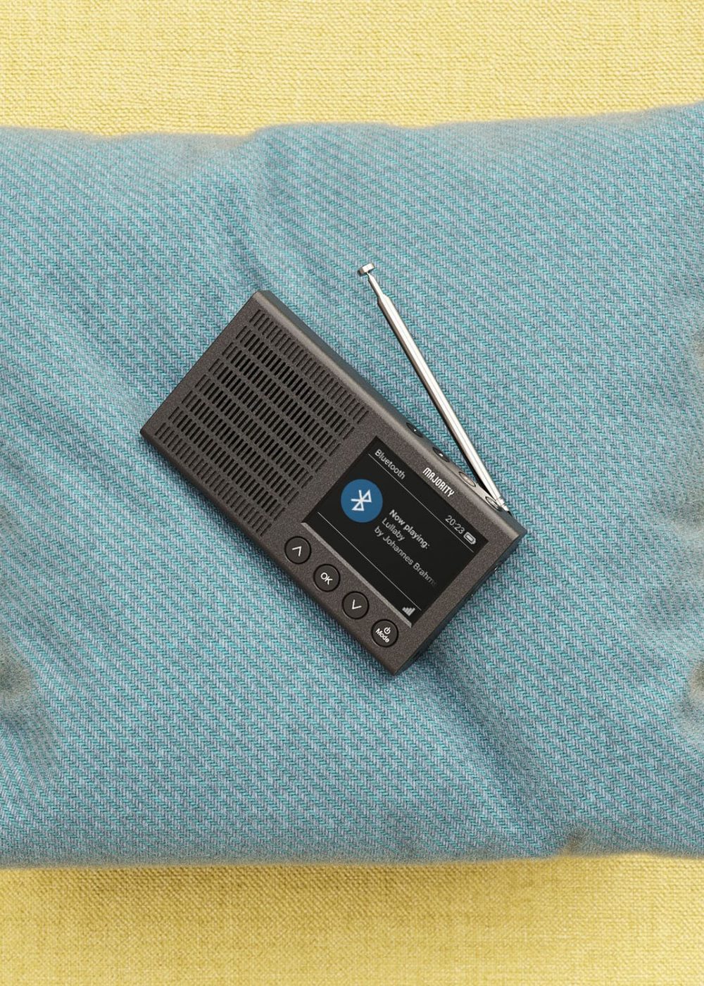 Compact DAB+ Radio on pillow